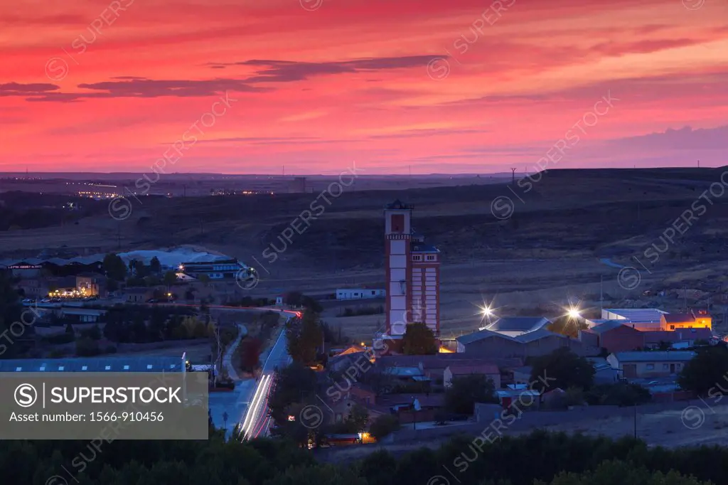 Spain, Castilla y Leon Region, Segovia Province, Segovia, elevated view of grain elevator and mill, dusk