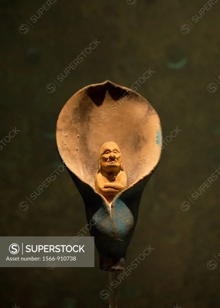 A Mayan statuette of a man emerging from a flower found in Isla de Jaina, Campeche state, is displayed in the National Museum of Anthropology in Mexic...