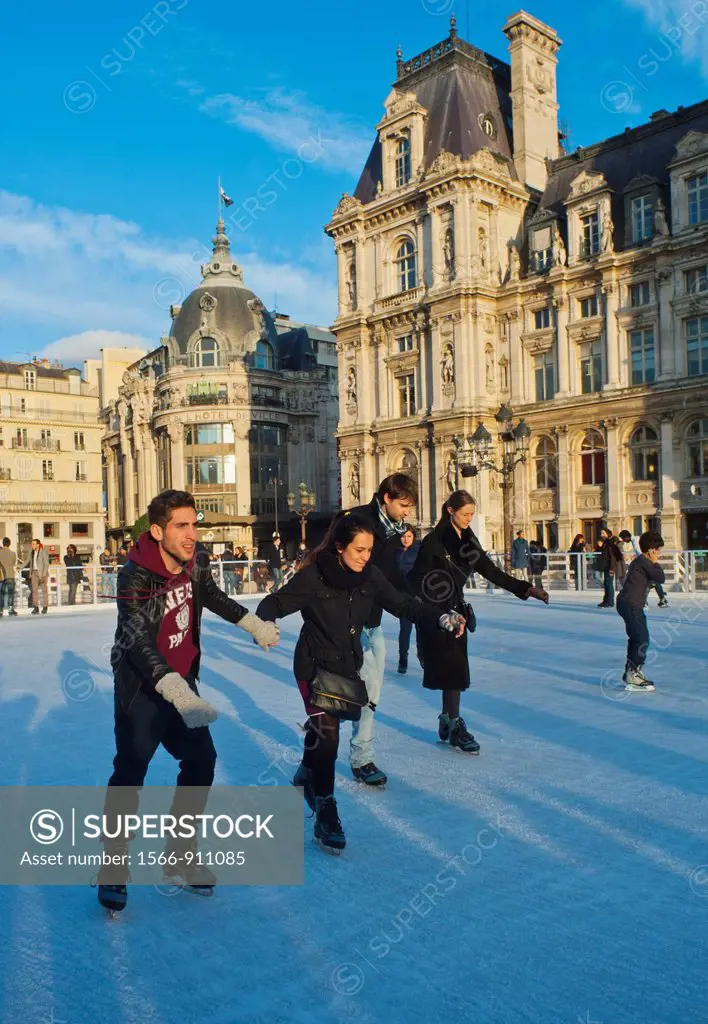 Paris, France, Town Square, in Front of City Hall Building, with Teenagers Ice Skating in Outdoor Skating Ring