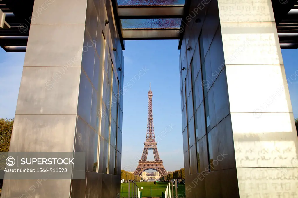 View of the Eiffel Tower, Tour Eiffel, Champ de Mars, ´Les murs de la paix´ artwork on Place Joffre, Paris, Ile de France, France, Europe