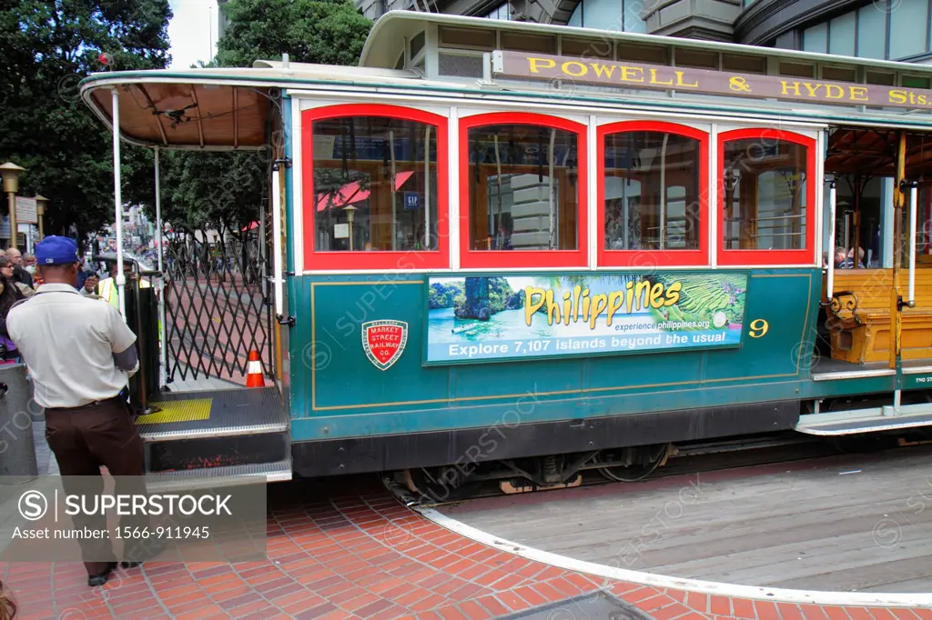 California, San Francisco, Powell Street, Hallidie Plaza, downtown street scene, transit system, historic cable car, icon, man-powered turntable, Blac...