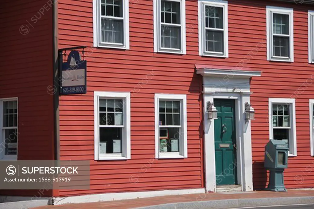 A building that appears to have been built long ago as a home now contains a realtor´s offece  Portsmouth, New Hampshire, United States