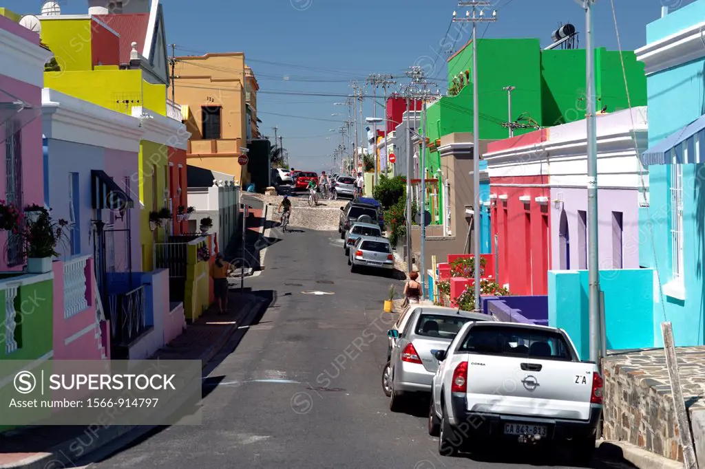 Colorful houses alongside a street ligned with cars, Bo-Kaap Malay Muslim District, Cape Town, South Africa