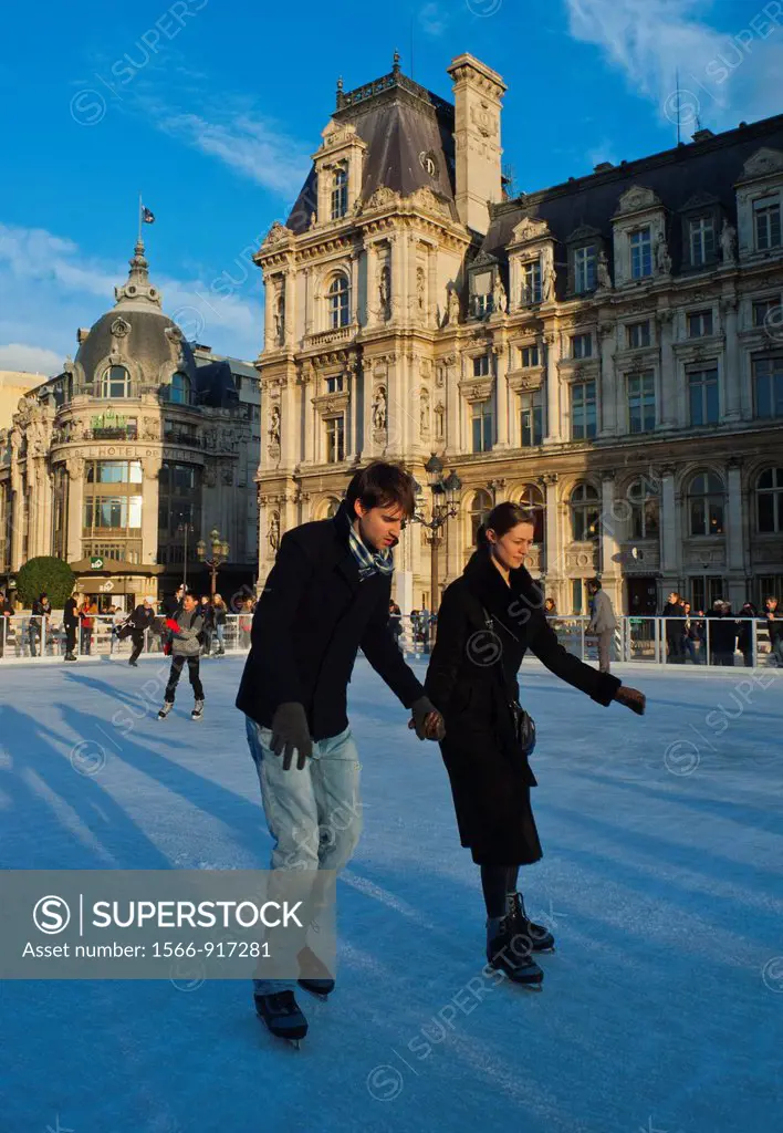 Paris, France, Town Square, in Front of City Hall Building, with Teenagers Ice Skating in Outdoor Skating Ring