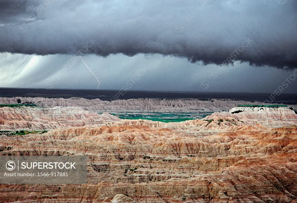 Lightning storm above sedimentary formations, North Unit, Badlands National Park, South Dakota, USA