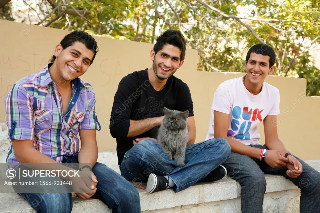 Young men at the upmarket neighbourhood Jabal Amman, Amman, Jordan