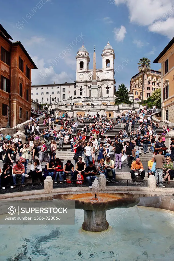 Vertical of tourists enjoying the Spanish Steps Piazza Di Spagna in Rome, Italy