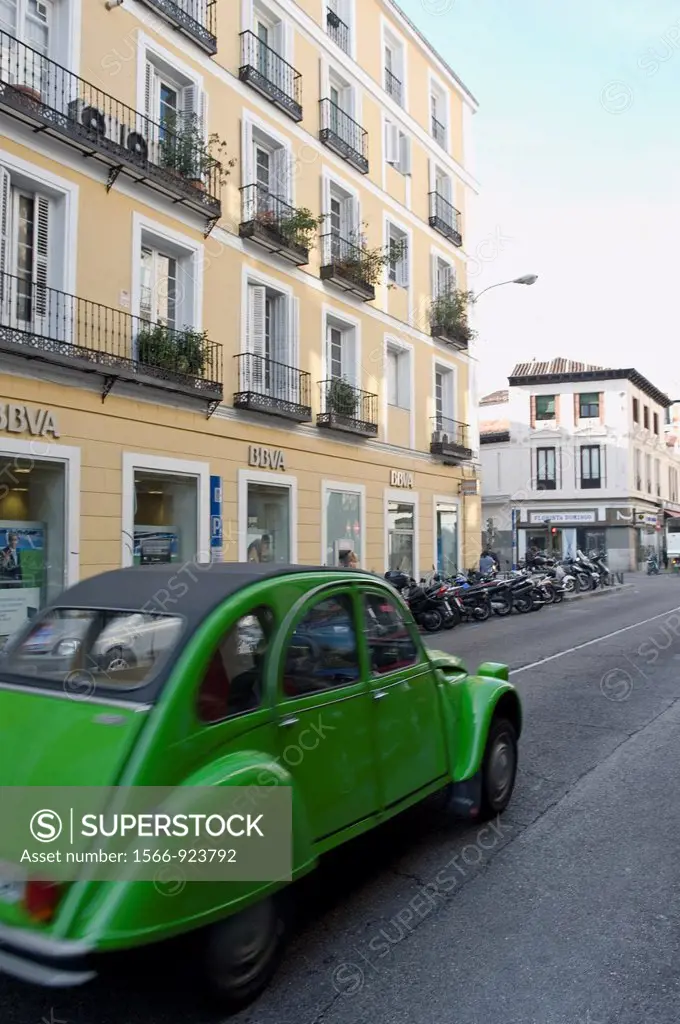 Old green car on the street in Madrid, Spain