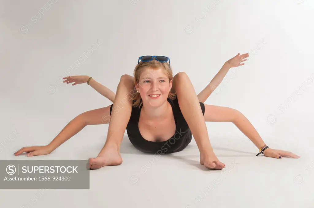 Blonde girl lying on the floor simulating bodily contortions.