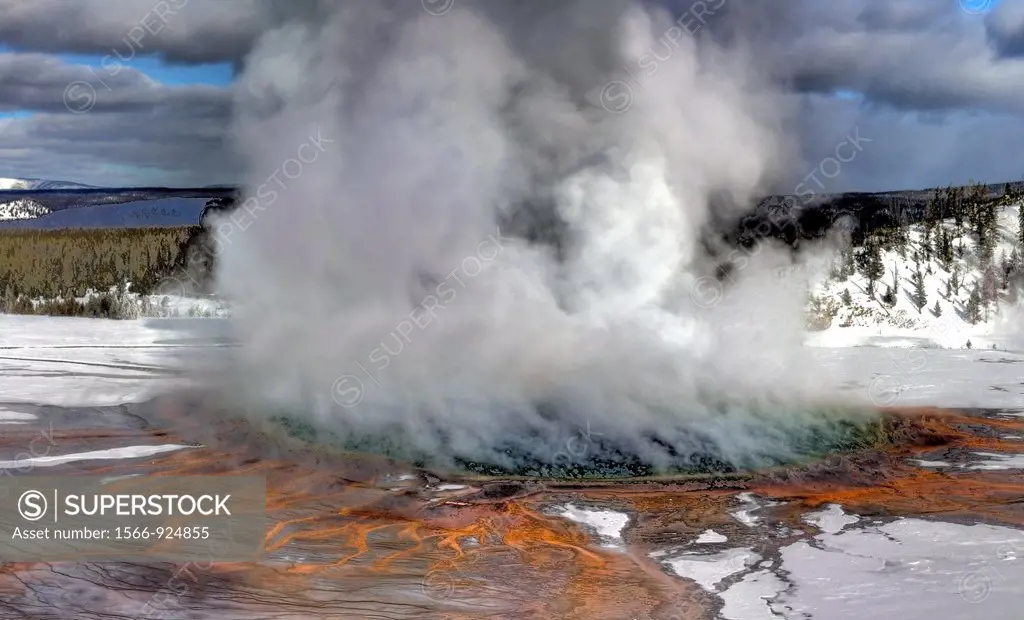 The Grand Prismatic hot spring shows its colors during the winter at Yellowstone National Park