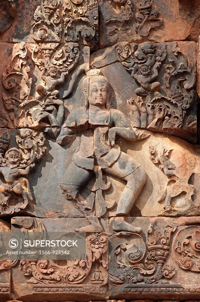 God Shiva with multiple arms depicted on the eastern gopura of the inner enclosure wall, Banteay Srei temple, Citadel of the Women, Angkor, Cambodia