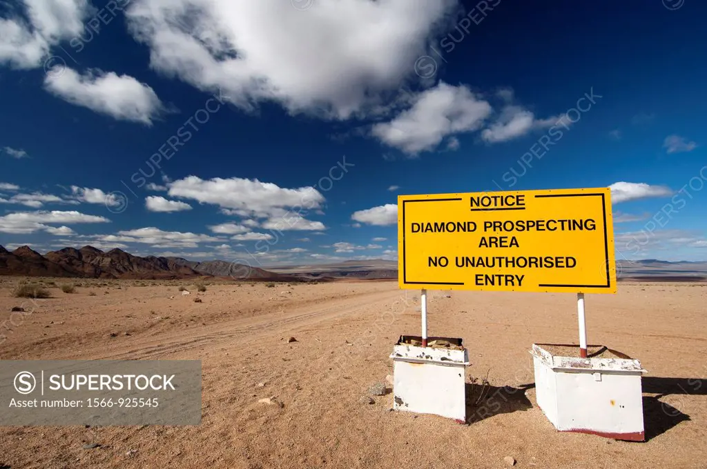 Prohibition sign at the entrance to a diamond prospecting area in the border region between South Africa and Nambia behind, Richtersveld National Park...