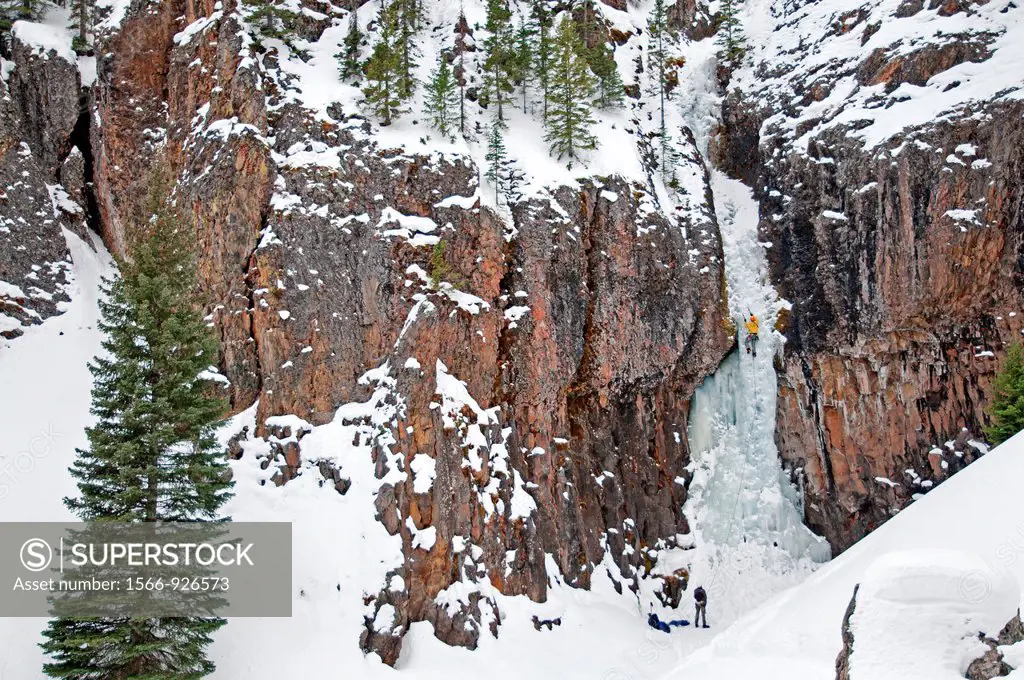 Ice climbing a route called The Elevator Shaft which is rated WI-4 and located at the Unnamed Wall in Hyalite Canyon near the city of Bozeman in south...
