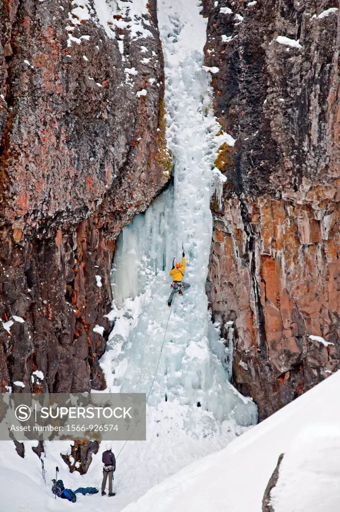 Ice climbing a route called The Elevator Shaft which is rated WI-4 and located at the Unnamed Wall in Hyalite Canyon near the city of Bozeman in south...
