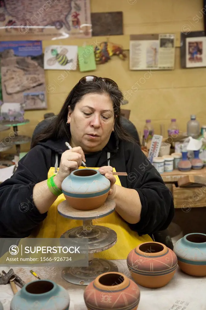 Rapid City, South Dakota - Jeanne High Elk, a member of the Cheyenne River Sioux, creates pottery at Sioux Pottery