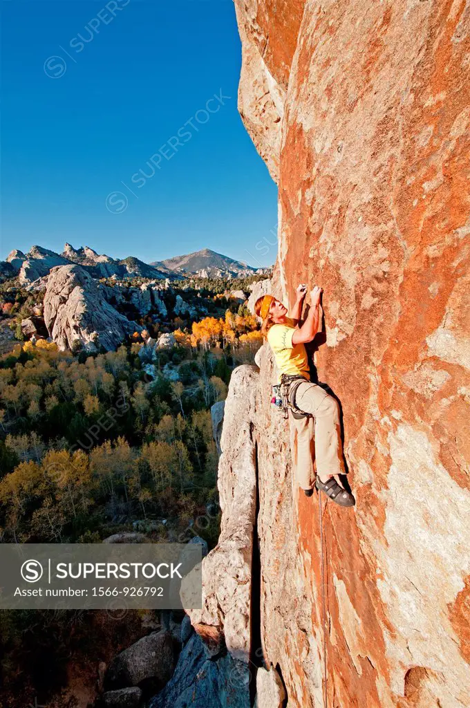 Rock climbing a route called Firewater which is rated 5,11 and located on Flaming Rock at the City Of Rocks National Reserve near the town of Almo in ...