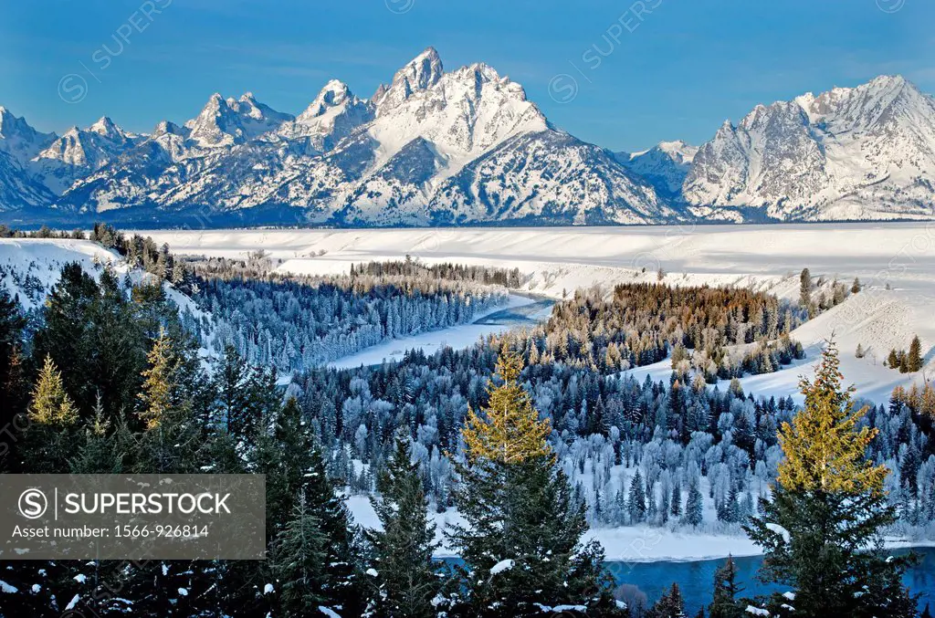 Tetons, morning light on The Teton Range and Grand Teton in winter above the Snake River at Grand Teton National Park in northern Wyoming