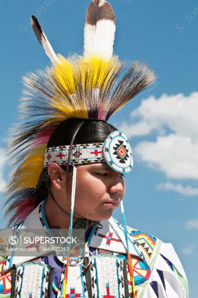 Young Blackfoot man in traditional regalia, Siksika Nation Pow-wow, Gleichen, Alberta, Canada
