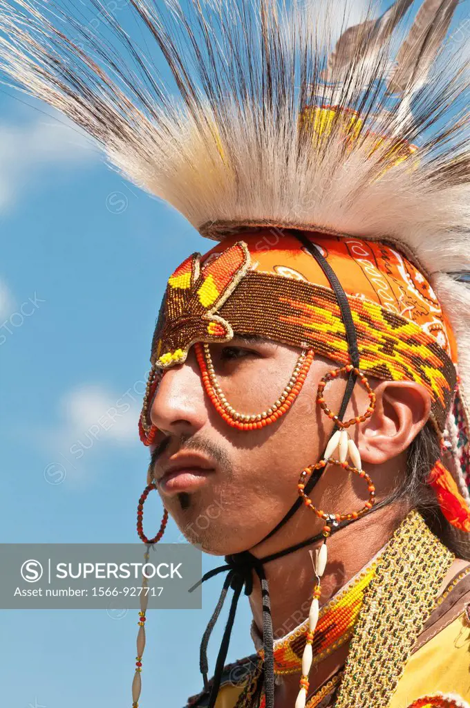 Young Blackfoot man in traditional regalia, Siksika Nation Pow-wow, Gleichen, Alberta, Canada