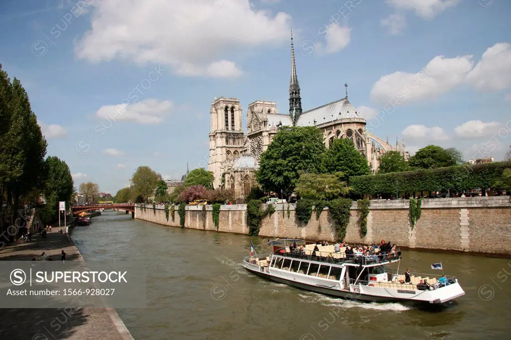 Paris - France, Notre Dame de Paris. Tourist boat on the Seine