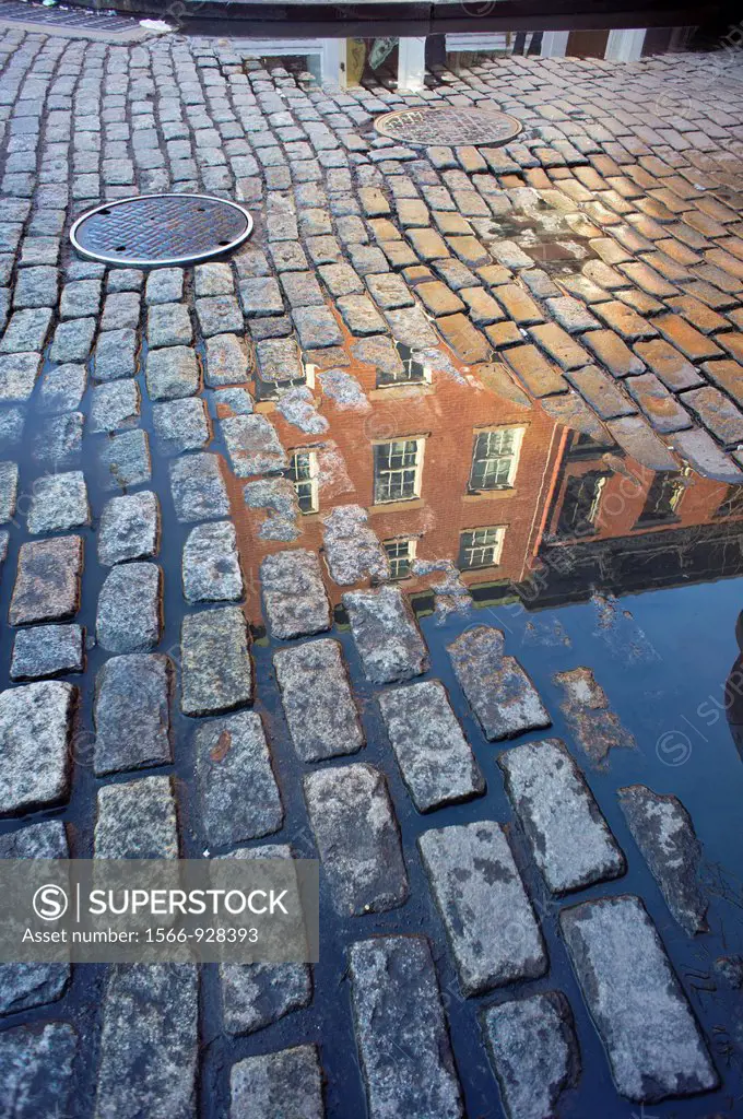 A detail of a street in the West Village neighborhood of New York paved with Belgian Blocks Streets in New York City were never paved with cobblestone...