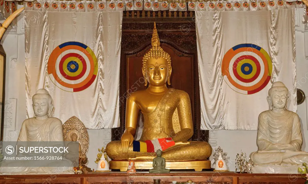Buddha image in the Temple of the Tooth Sacred Relic Dalada Maligawa in Kandy, Sri Lanka