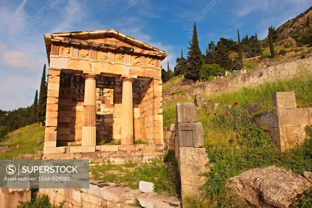 The reconstructed Treasury of Athens, built to commemorate their victory at the Battle of Marathon  Delphi, archaeological site, Greece,