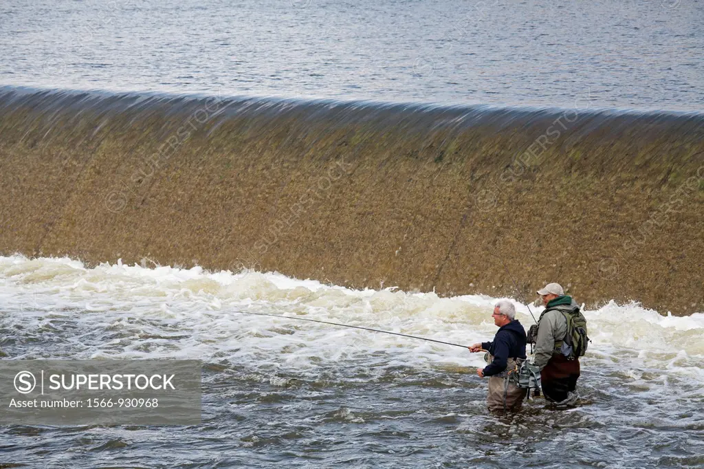 Grand Rapids, Michigan - Fishermen below a dam on the Grand River in downtown Grand Rapids