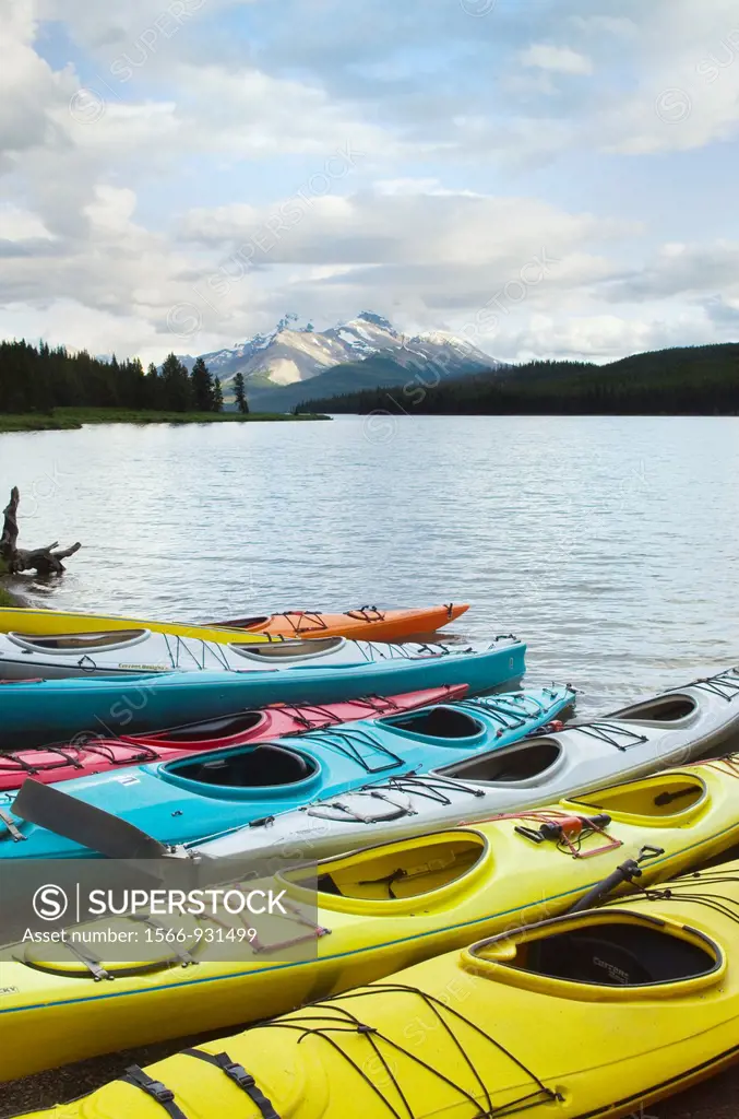 Colorful kayaks on Maligne Lake, Jasper National Park Alberta Canada