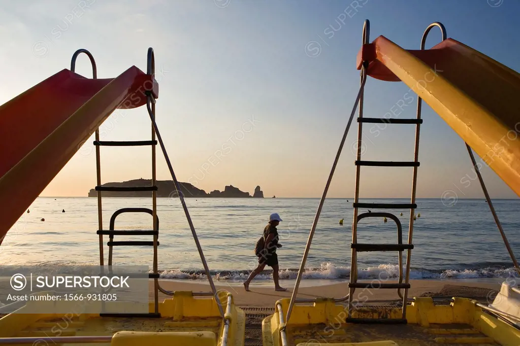 L´Estartit  Pedal boats in Gran beach  In background Medes Islands Costa Brava  Girona province  Catalonia  Spain