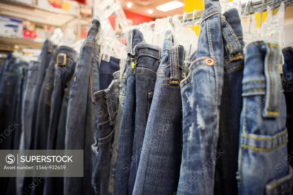 Denim jeans for sale in a thrift store in New York Because of the worldwide economic recovery leading to a rise in raw materials and labor costs the p...