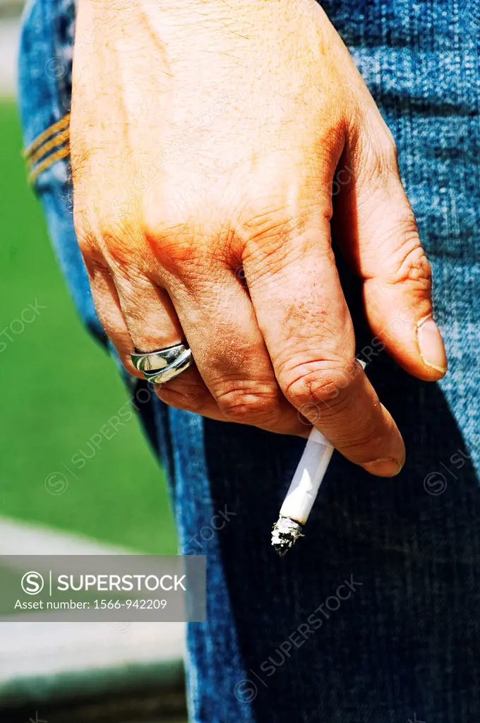 Hand with cigar