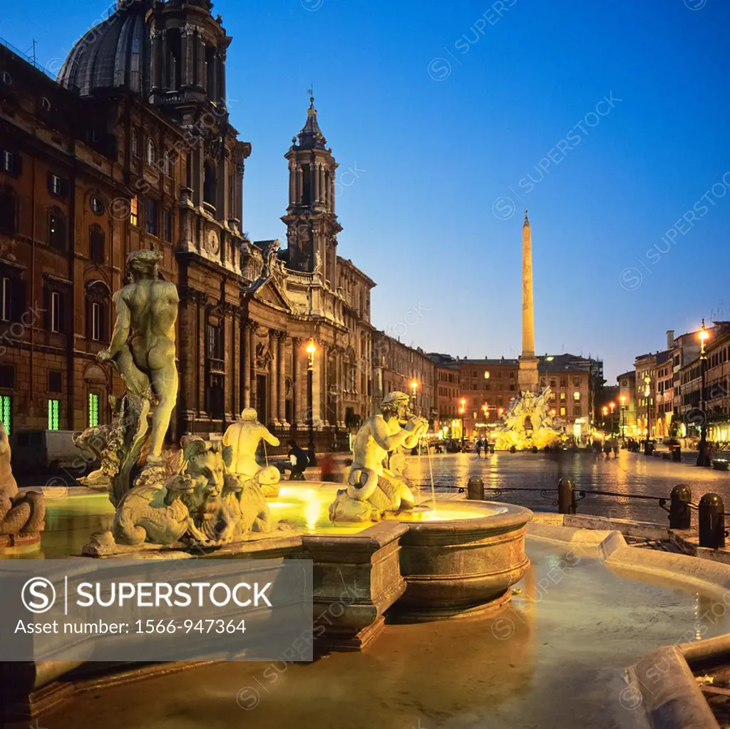 Fontana del Moro, Fountain of the Moor, Piazza Navona square at dusk, Rome, Italy
