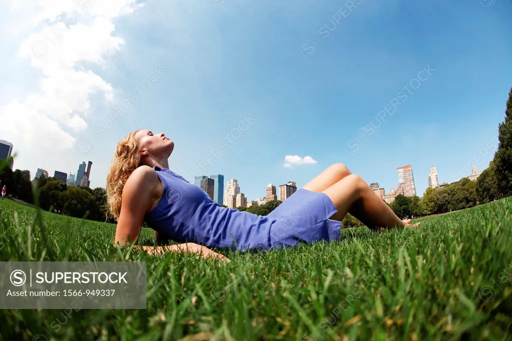 Young woman poses in Central Park, New York, USA