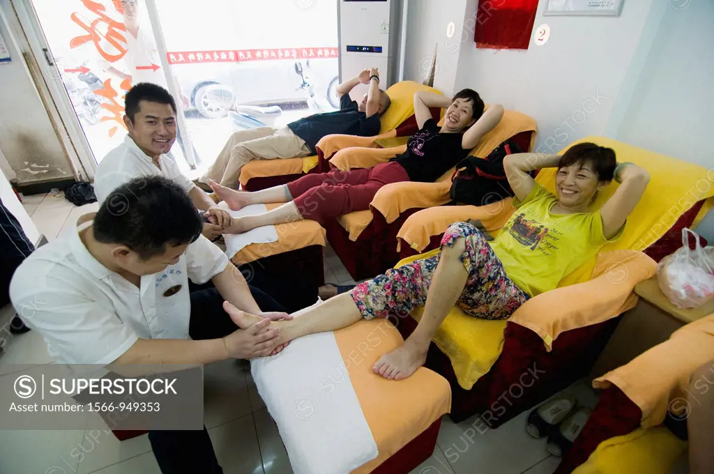 Traditional Chinese reflexology in a small clinic in Nanjing.