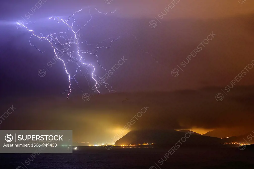 Night photography of a thunderstorm in the Port of Bilbao