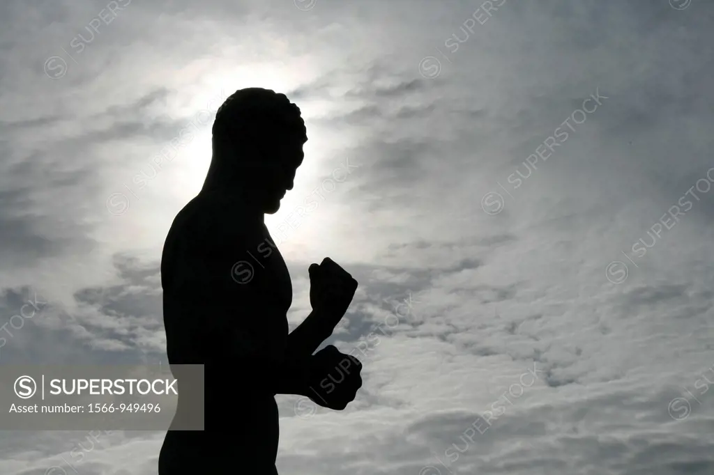 detail of male boxer s statue at stadio dei marmi rome italy