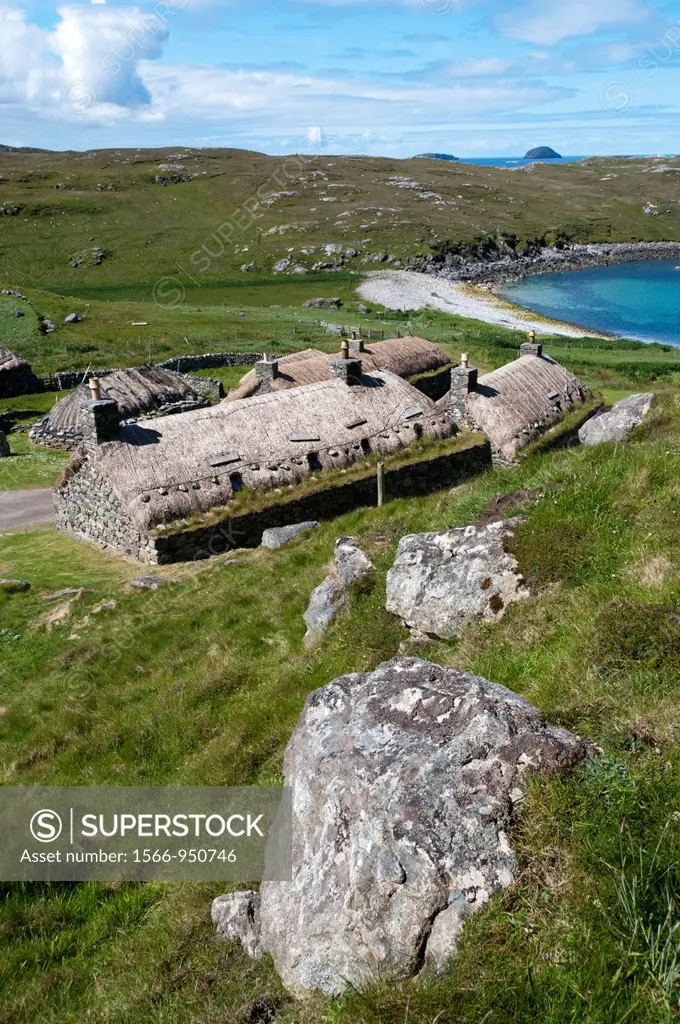 Europe, UK, Scotland, Isle of Lewis, Outer Hebrides - the restored Blackhouse Village of Gearrannan, with some of the restored dwellings now used as s...