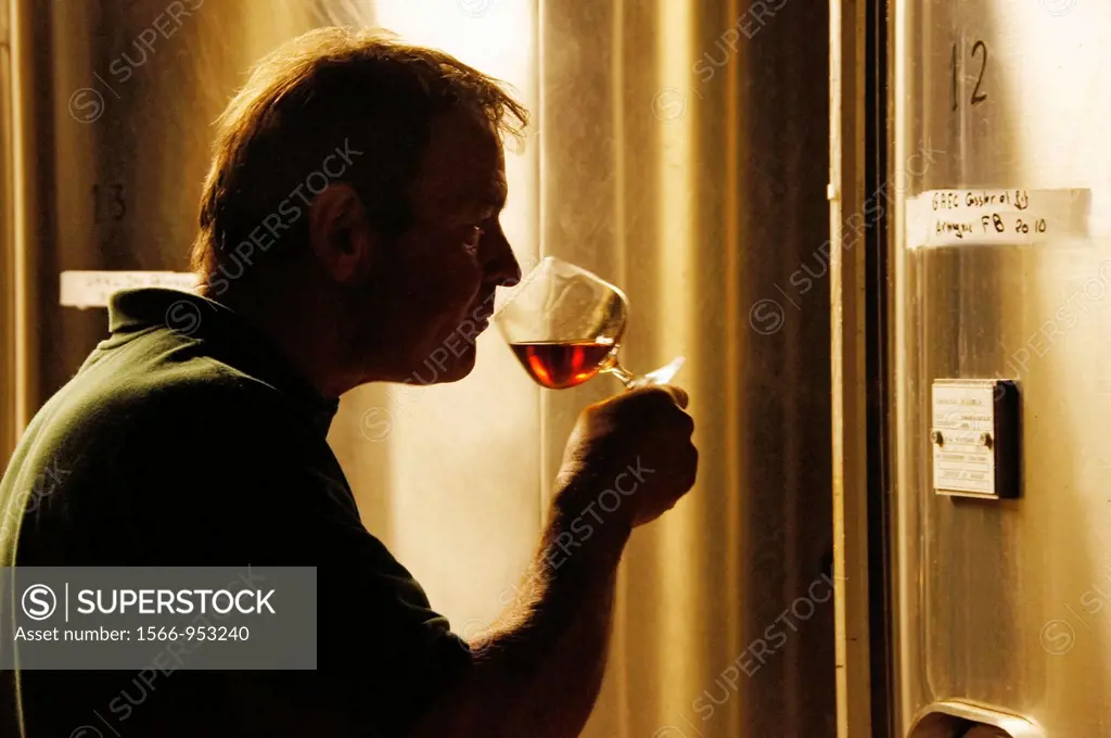 Olivier Gessler tasting his armagnac at the Domaine de Joÿ wines and armagnac estate, at Panjas, Gers, Midi-Pyrenees, France
