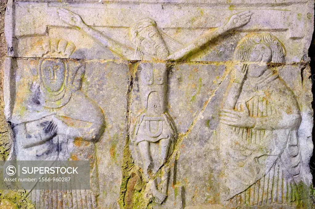 Ireland, County Tipperary, Rock of Cashel, The cathedral, Tomb sculpture representing the crucifixion and weepers