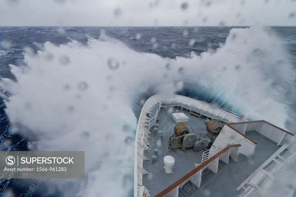 The Lindblad Expeditions ship National Geographic Explorer in a Beaufort Scale 10 storm 35 foot seas and 50+ knot winds in the Drake Passage between t...