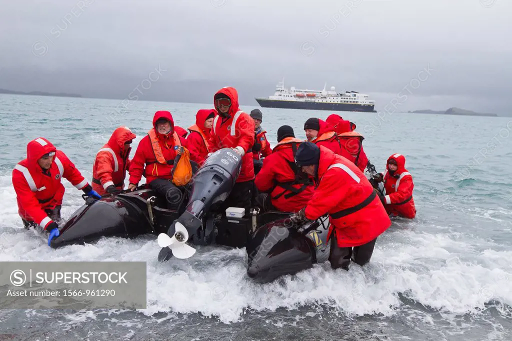 Lindblad and National Geographic Expeditions staff members conducting Zodiac landings in surf at Salisbury Plain, South Georgia Island, UK Overseas Pr...
