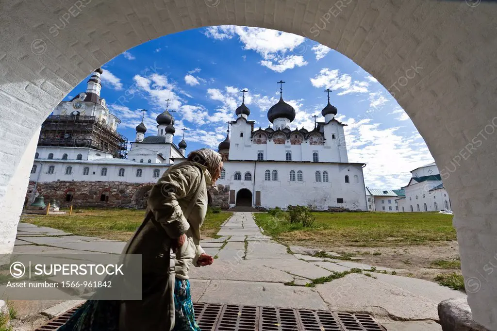 A Russian woman inside the Russian Orthodox Solovetsky Monastery founded in 1436 by 2 monks on Bolshoy Island, Solovetsky Island Group, White Sea, Rus...