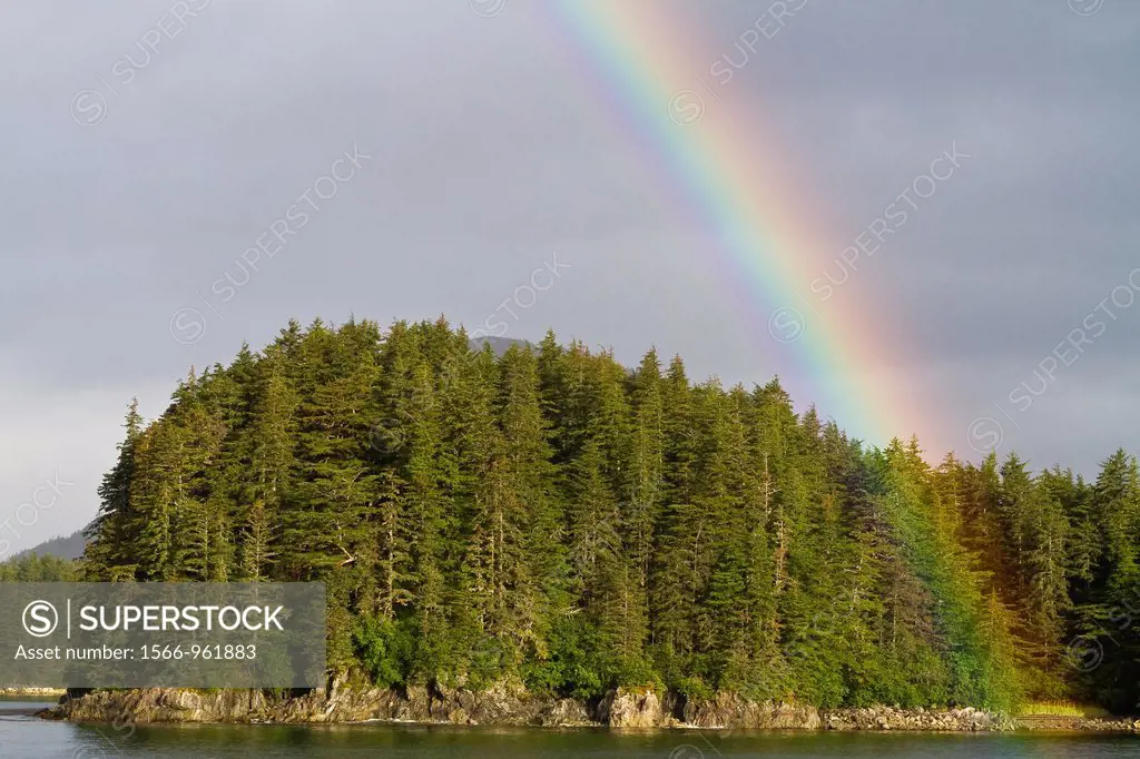 Rainbow over the calm waters of Inian Pass in southeast Alaska, USA, Pacific Ocean