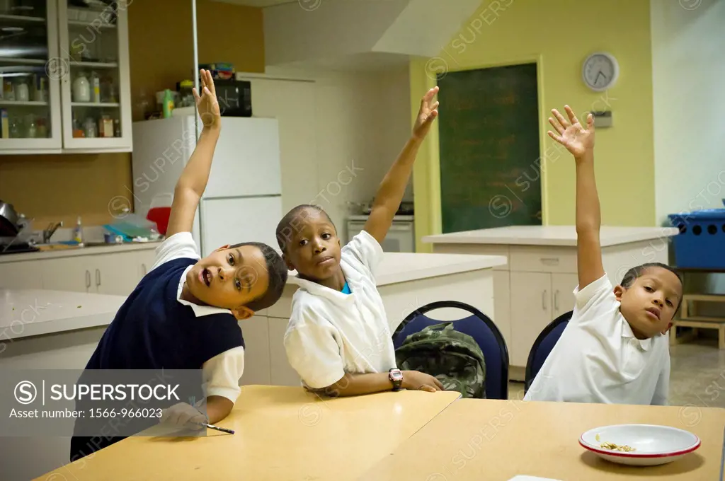 As part of National Food Day, second and third graders participate in a Plant Part Pizza cooking session at Columbia University´s Teachers College in ...