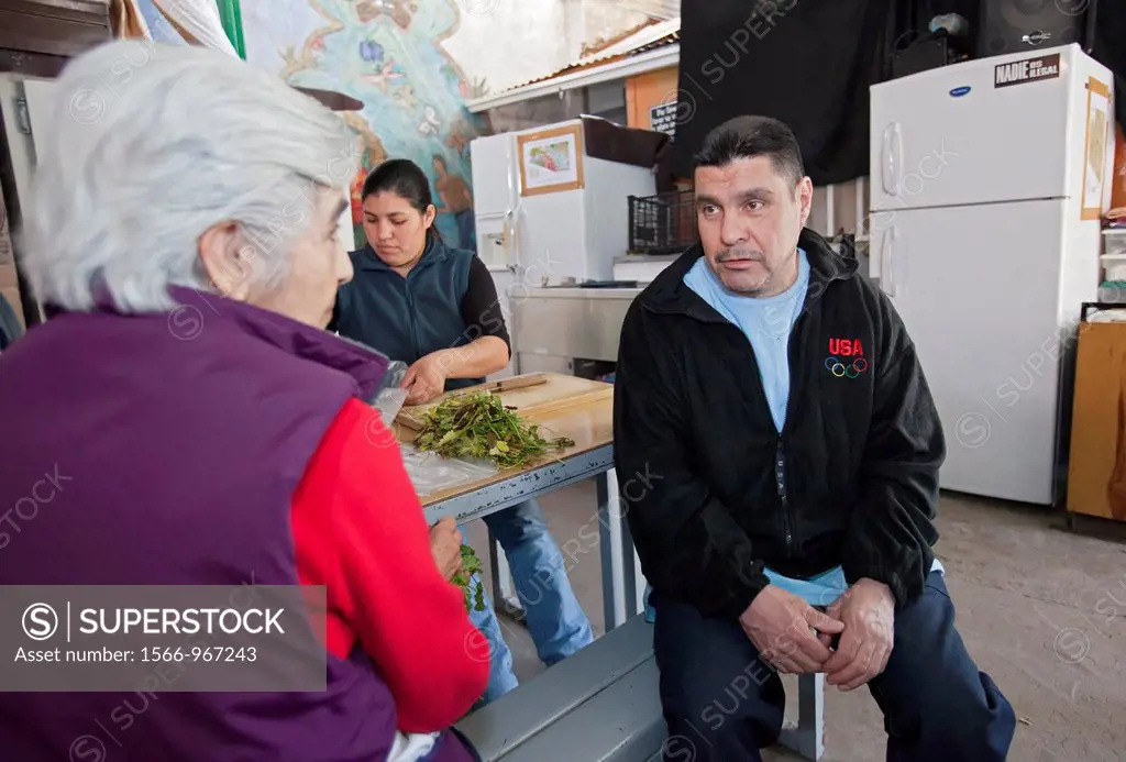 Nogales, Sonora, Mexico - A 46-year-old man who had just been deported from the United States tells his story to Sister Maria Engracia Robles of the M...
