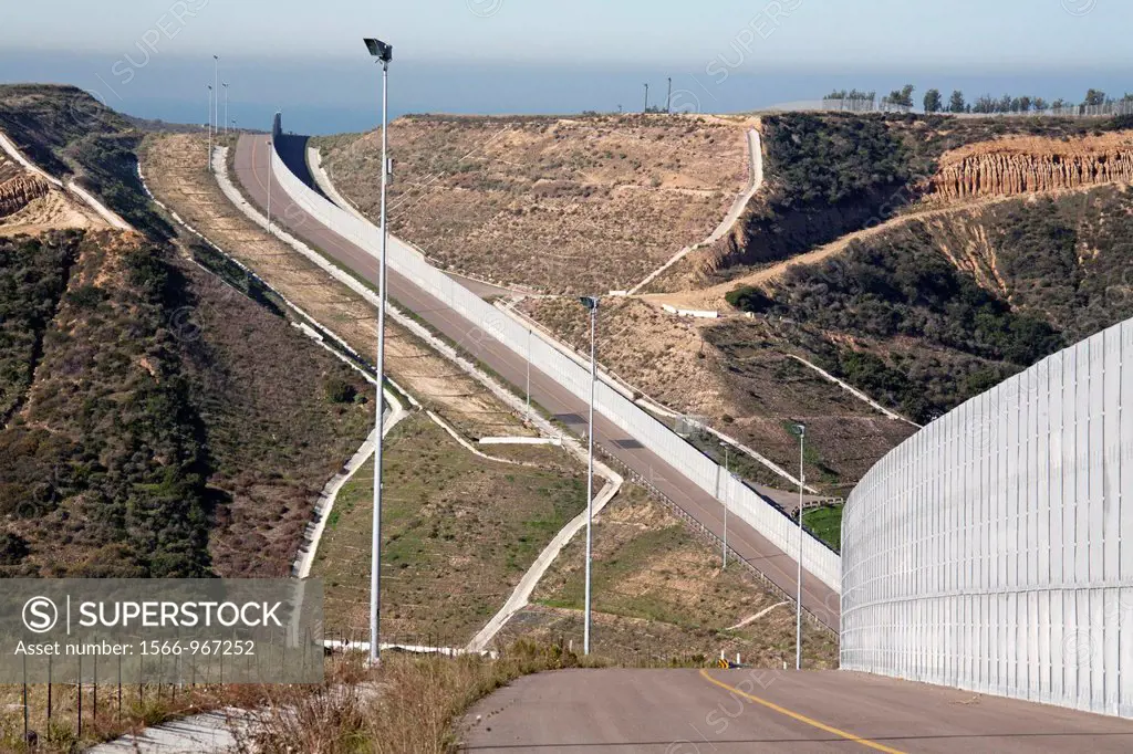 San Ysidro, California - The Border Patrol´s new all-weather patrol road and fence along international border between the United States and Mexico  Me...