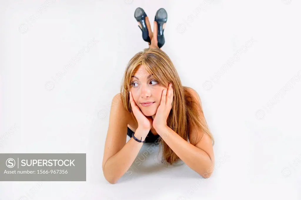 Woman model looking sideways on the floor