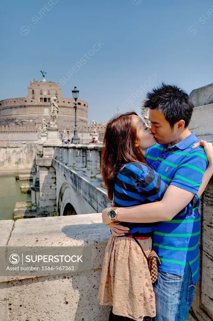 Couple kissing at Castel Sant´Angelo Rome Italy