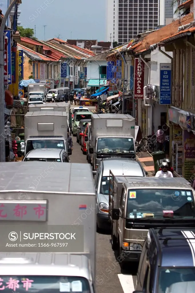 Traffic waits Dunlop Street and Serangoon Road junction Little India Singapore